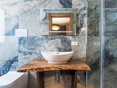 a bathroom with a sink and a mirror at Villa Cleope by Interhome in Castellammare del Golfo