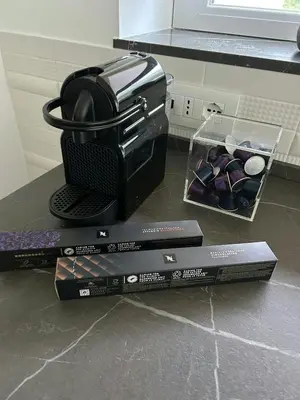 three black boxes sitting on top of a counter at Sustainable Villa With Infinity Pool in Castellammare del Golfo