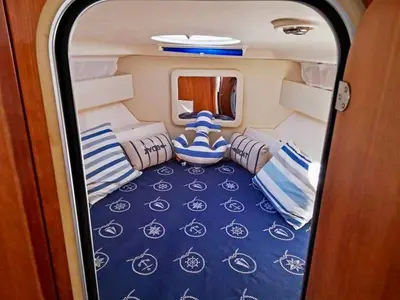 a view of the back of a room with pillows at Palermo Boat Experience in Isola delle Femmine