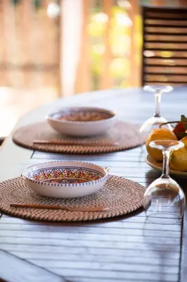 a table with two plates of food on top of it at Exclusive Villa Eden in Castellammare del Golfo