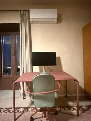 a room with a wall and a dresser and a bed at Xenia Signature Guest House in Palermo