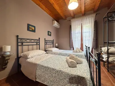 a bedroom with two beds and a window at Historic Center - Apartment with 2 Bedrooms in Palermo
