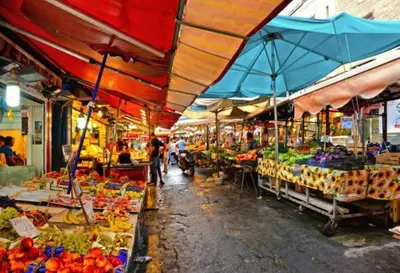 a market with a bunch of fruits and vegetables at Historic Center - Apartment with 2 Bedrooms in Palermo