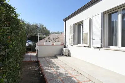 a side view of a house with a window at Casa Verdemare in Cefalù