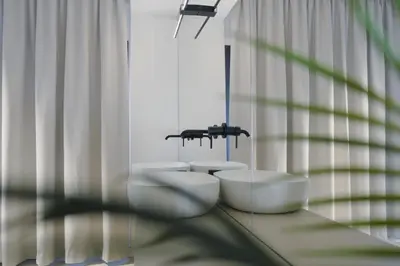 a bathroom with two sinks in front of a mirror at Idro Luxury Suite in Palermo