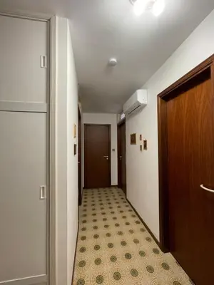 an empty hallway with a door and a floor at Sea view terrace house in Alcamo
