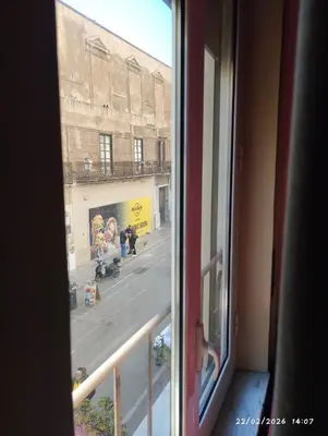 a view of a street from a window at Nanà in Movida in Palermo
