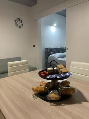 a table with a tray of bread on top of it at Luma Sixty nine in Alcamo