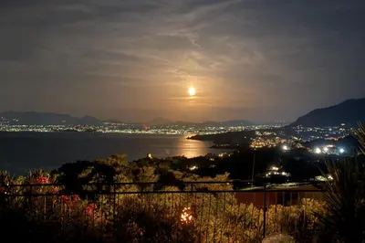 a view of the sun setting over the water at Zingaro Anima Maris, tra Scopello e Lo Zingaro in Castellammare del Golfo