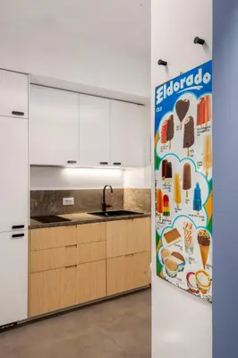 a kitchen with an ad for elated ice cream refrigerator at PAT Amazing & Charm cozy apt in Palermo