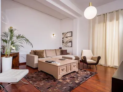 a living room with a couch and a table at Apartment Wohnung dei Mori in Terrasini by Interhome in Terrasini