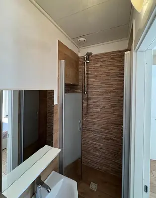 a bathroom with a shower and a sink at ÀSicilia Home Holiday in Palermo
