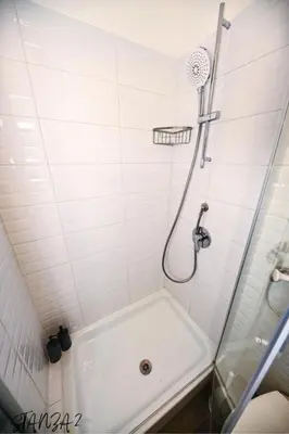 a bathroom with a shower with a bath tub at Terra Sicula Ballaroom in Palermo