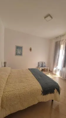 a bedroom with a bunk bed and a ladder at La Casuzza 3 al mare in Palermo