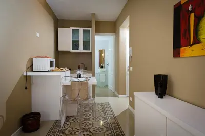 a small kitchen with a sink and a counter at Via Nuova in Castellammare del Golfo