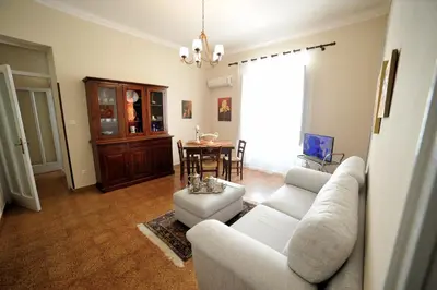 a living room with a couch and a table at Case Vacanze Terra Sinus in Terrasini