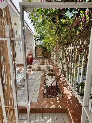 an entrance to a garden with a fence at Casa Perciata - Locazione Turistica in Mondello