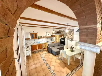 a living room with a couch and a table at Villa esclusiva Milazzo Annarita in Castellammare del Golfo