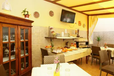 a kitchen with a table with food on it at Coralia Bed & Breakfast in San Vito lo Capo