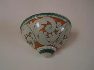 a bowl with a design on it sitting on a table at Olivella Suite Ecological House in Palermo