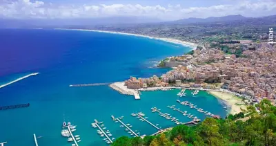 an aerial view of a harbor with boats in the water at Appartamento Spiaggia Playa in Castellammare del Golfo