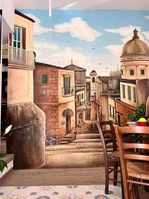 a painting of a city street at Bahalara Alloggio in Palermo
