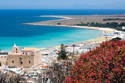 a view of a beach and the ocean at Alba Marina B&B in Castelluzzo