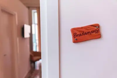 a sign on a door with the word bombardment on it at B&B L'Orlando Furioso in Palermo