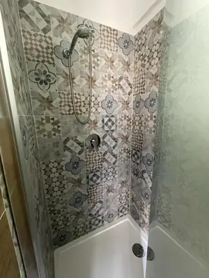 a bathroom with a shower with a tub at Hotel Cortese in Palermo