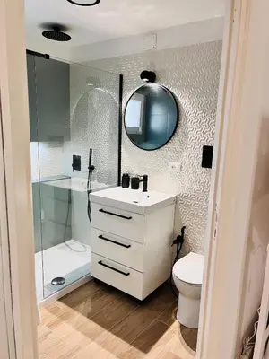 a bathroom with a sink and a toilet and a shower at Fiori d'Arancio in Terrasini