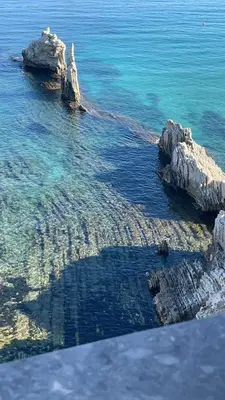 a view of the ocean with rocks in the water at Fiori d'Arancio in Terrasini