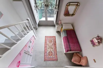 a room with two bunk beds and a staircase at Piazza Marina Chic in Palermo