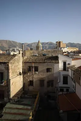 an overhead view of buildings in a city at Le Cupole Design in Palermo
