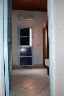 an empty room with a window and a floor at Soleluna in Castellammare del Golfo