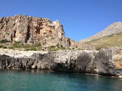a view of a rocky mountain from the water at Hellas Makari B&B in San Vito lo Capo