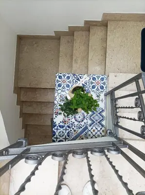 a kitchen counter with a gift on top of it at Carpe Diem Apartments in Castellammare del Golfo
