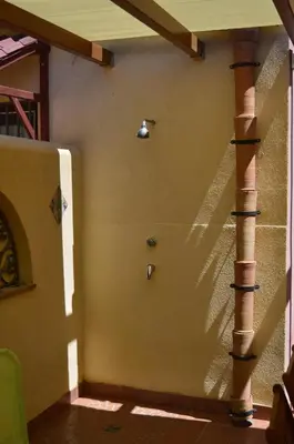 a room with a wall with a pillar and a door at Villa 'Antico Baglio' - Scopello - Castellammare Del Golfo in Castellammare del Golfo