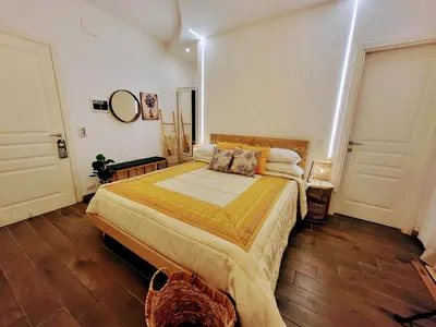 a bedroom with a large bed in a room at Atrium in Castellammare del Golfo