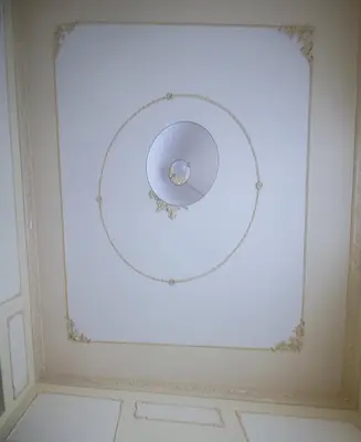 a ceiling with a round window in a room at La Cubba in Palermo