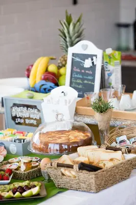 a table topped with lots of different types of food at Sui tetti b&b in Alcamo