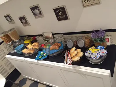 a counter with many different types of food on it at L'Opera Buffa in Palermo