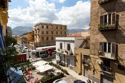 a view of a city street with buildings and cars at Oasi Centrale in Palermo