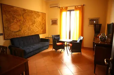 a living room with a couch and a table at Art Lincoln in Palermo