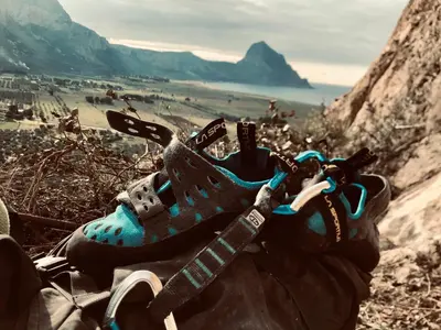 a pair of shoes sitting on top of a mountain at Appartamento Il Pomodoro in San Vito lo Capo