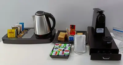 a coffee maker sitting on top of a table at Palermo al Centro - Appartamento Vittorio in Palermo