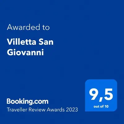 a blue sign that says awarded to villica san giovani at Villetta San Giovanni in Calatafimi