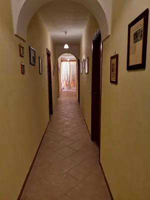 an empty hallway with a hallwayngthngthngthngthngthngthngthngthngthngth at Albergo Ristorante Pizzeria Del Viale in Palazzo Adriano