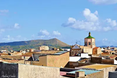 a view of a city with a church and buildings at Appartamento da Andrea in Alcamo