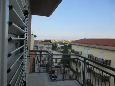 a view from the balcony of a building at Le Dimore di Enea in Castellammare del Golfo