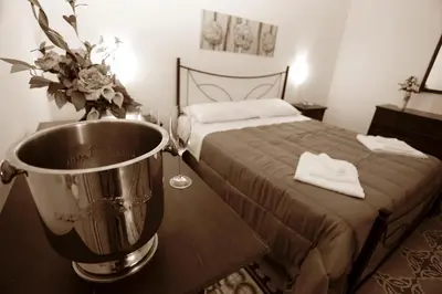 a bedroom with a bed and a blender on a table at Rest and Go in Palermo